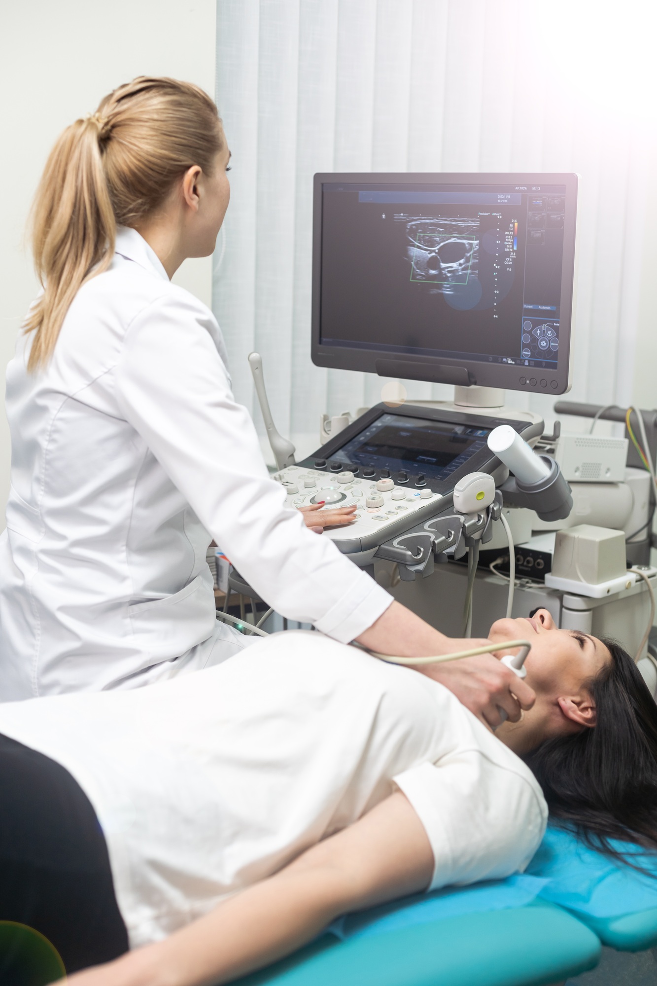 Smiling doctor, ultrasound. The doctor performed an ultrasound